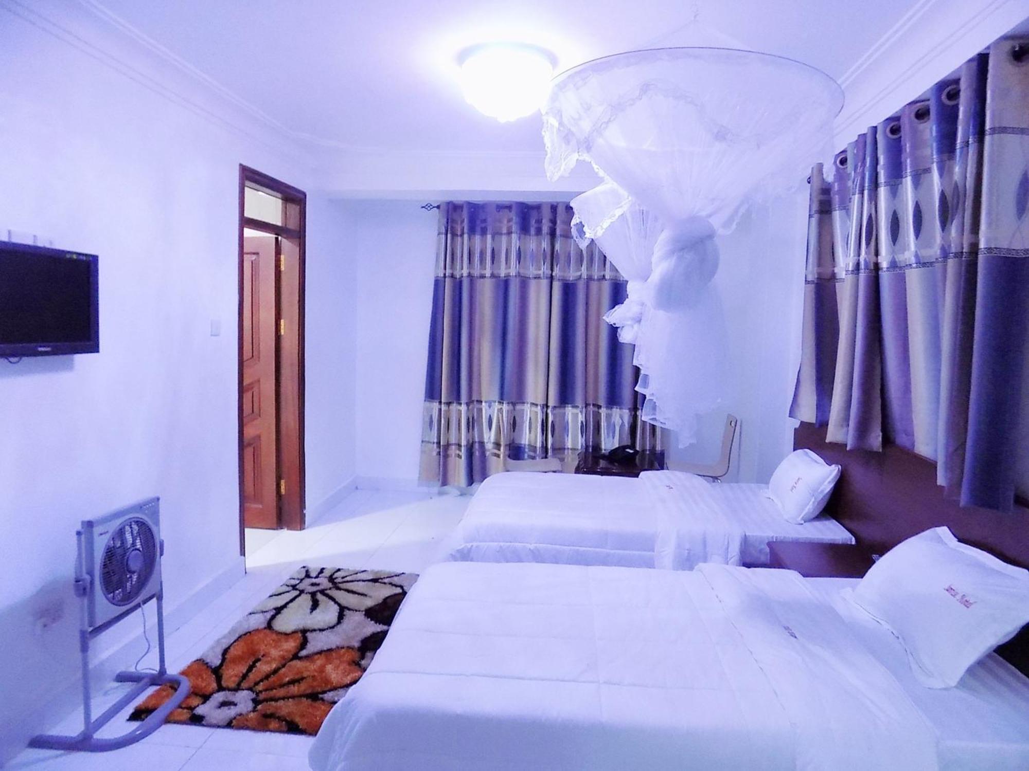 Sunrise Hotel Kampala Szoba fotó
